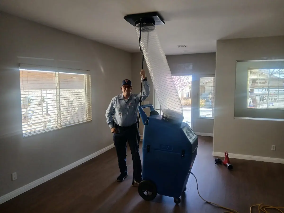 Professional Dryer Vent Cleaning work inside a Aloha home